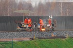 Gleisanbindung JadeWeserPort: Schienenschweißer bei der Arbeit
